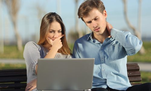 Couple searching on computer