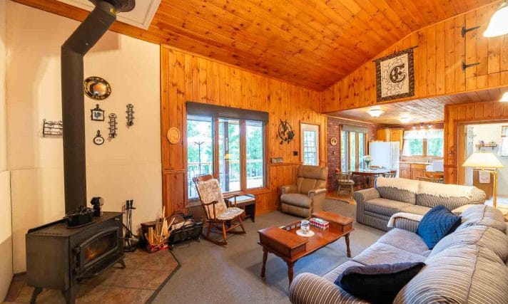 cottage Living room with wood stove